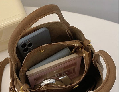 Gilded Arch-Handle Handbag