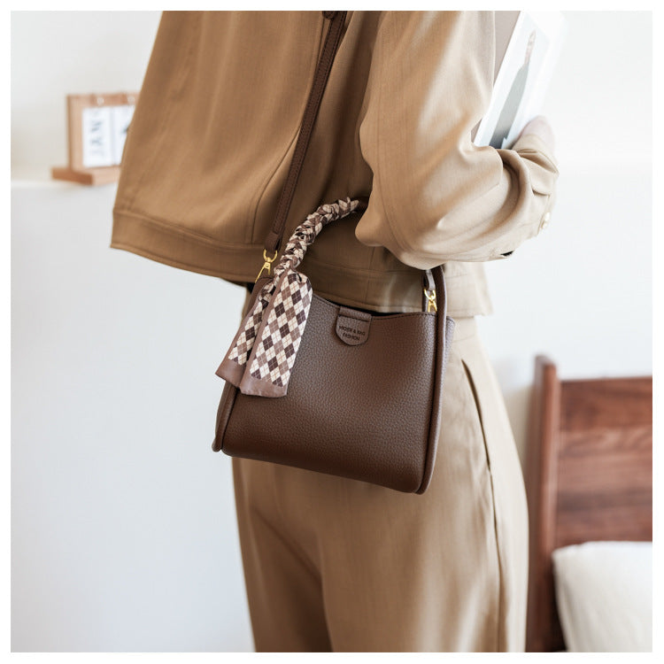 Gilded Arch-Handle Handbag