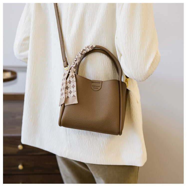 Gilded Arch-Handle Handbag